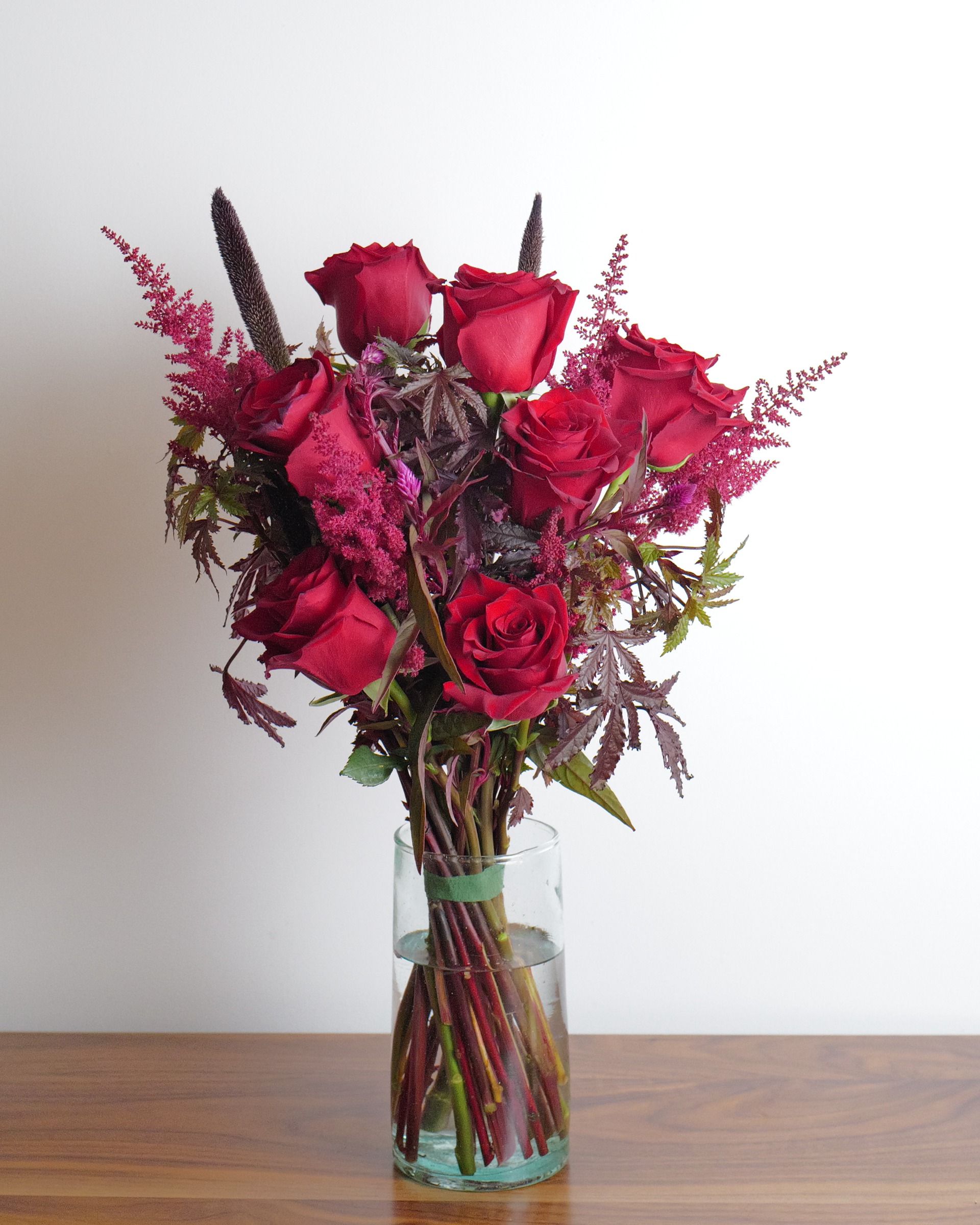 Dramatic goth flower bouquet featuring rich jewel-toned premium blooms.